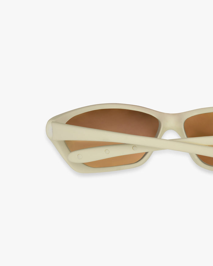 Product image of mens sunglasses in white on a plain white background | 247 Arena Sunglasses in Papyrus | Sunglasses with mirrored lenses and rubberised grip | 247 Accessories | Represent Clo