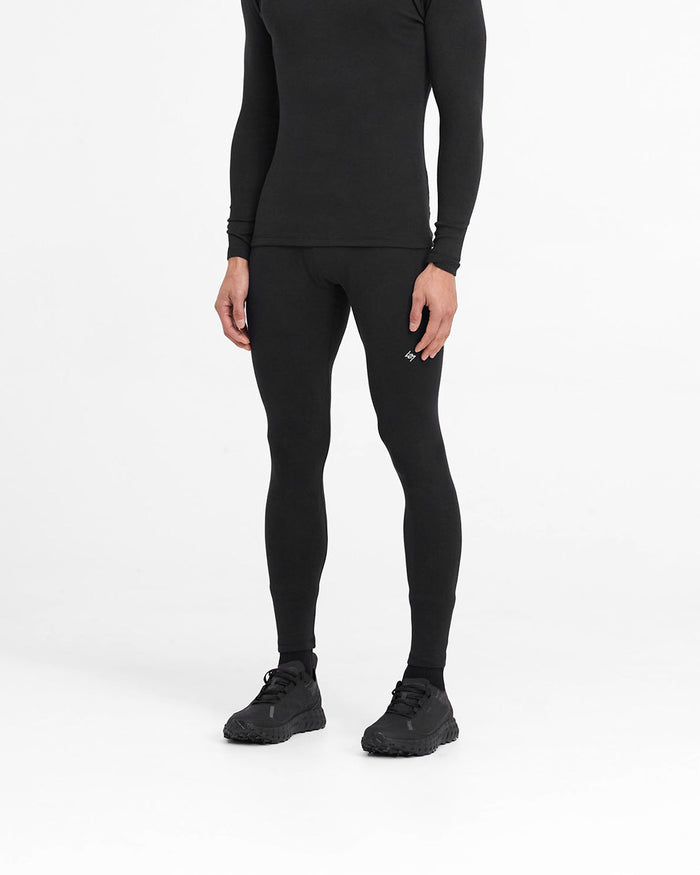 Back product image of mens black leggings on a plain white background | 247 Ribbed Legging in Black | Ribbed leggings with close fit and embroidered logo | 247 Pants | Represent Clo
