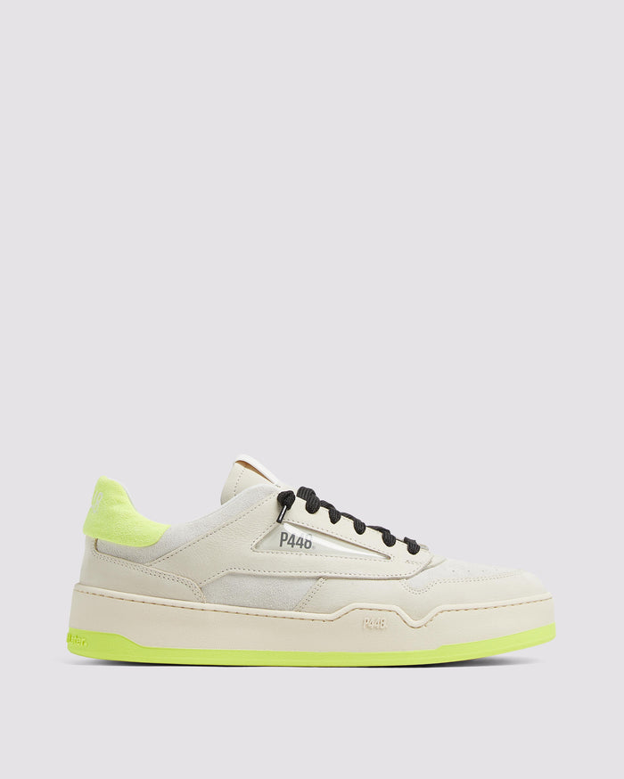 Side angle of beige and yellow sneakers