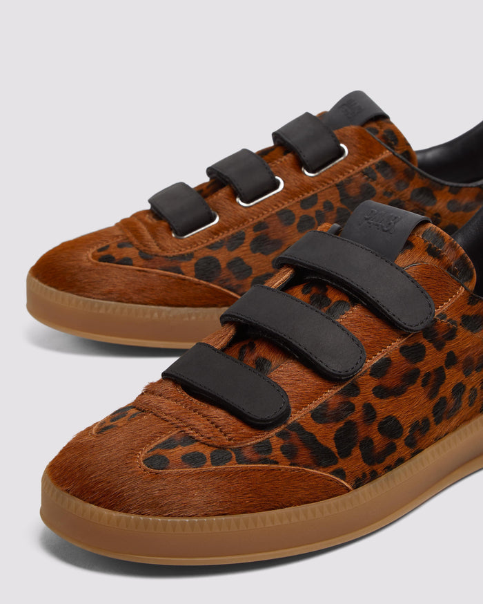 Side angle of leopard/brown and black/brown sneakers