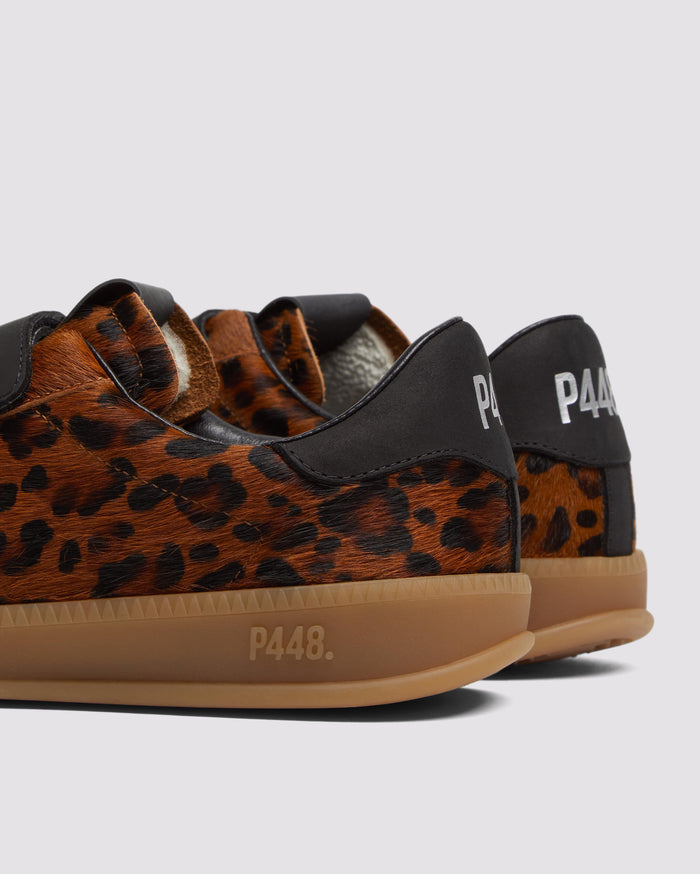 Side angle of leopard/brown and black/brown sneakers