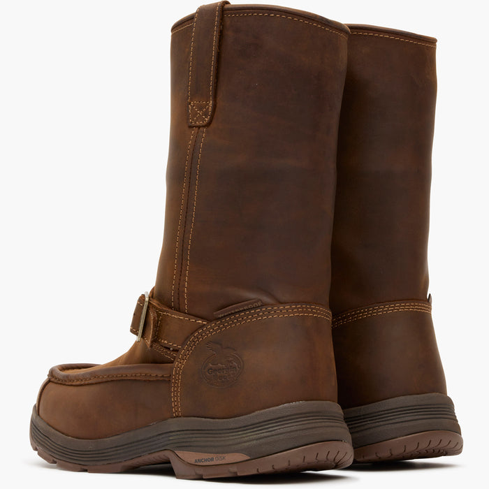 Pair of brown leather boots on a white background