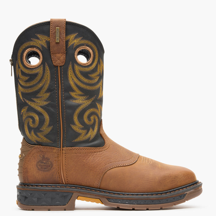 Brown cowboy boot with black leather upper on a white background