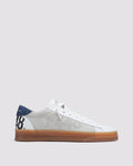 Side angle of beige and navy sneakers