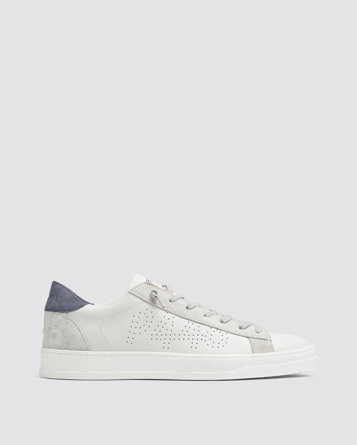 Side angle of white and blue sneakers