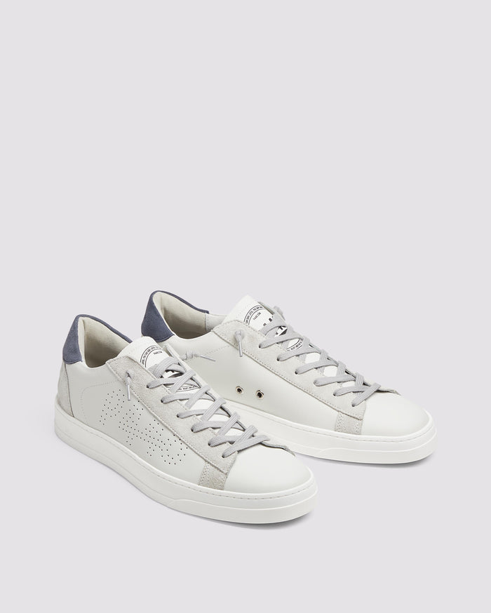 Back angle of white and blue sneakers