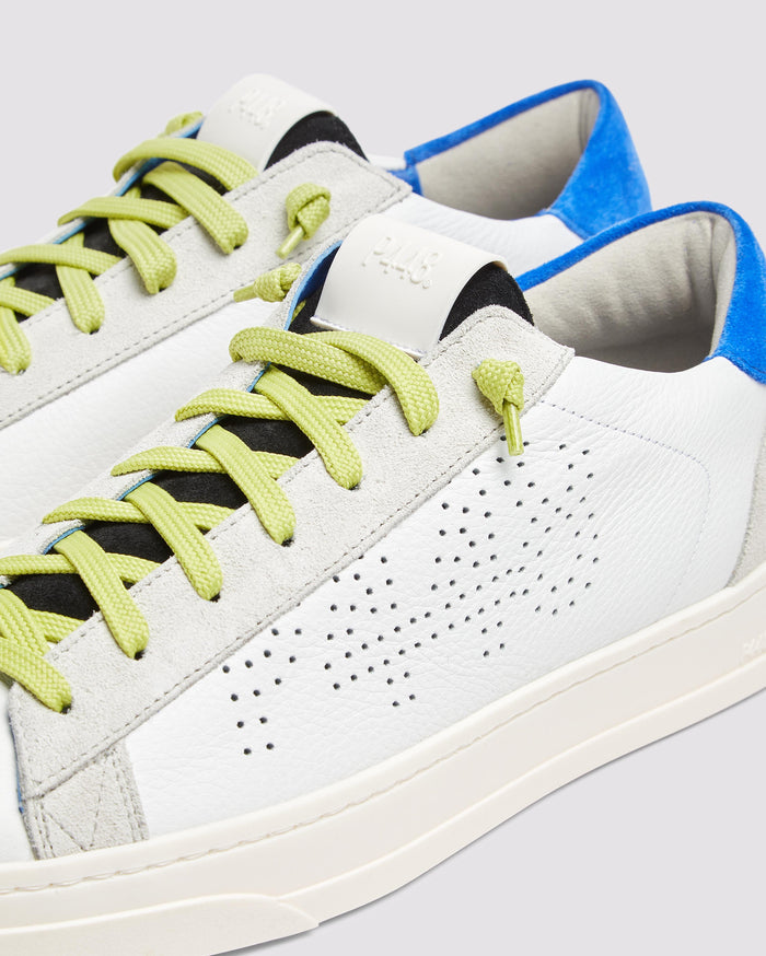 Side angle of white and blue sneakers