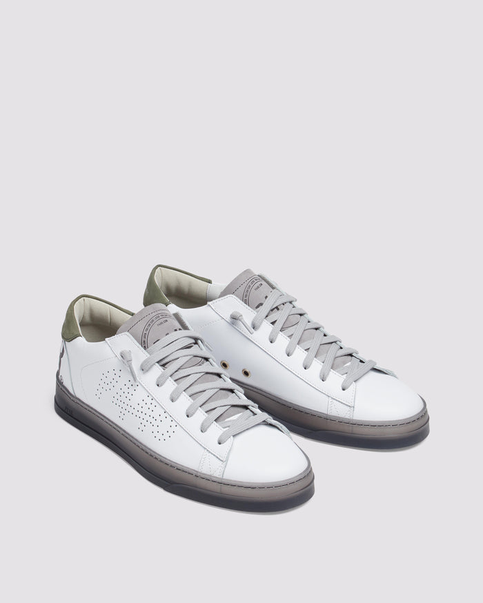 Back angle of white and green sneakers