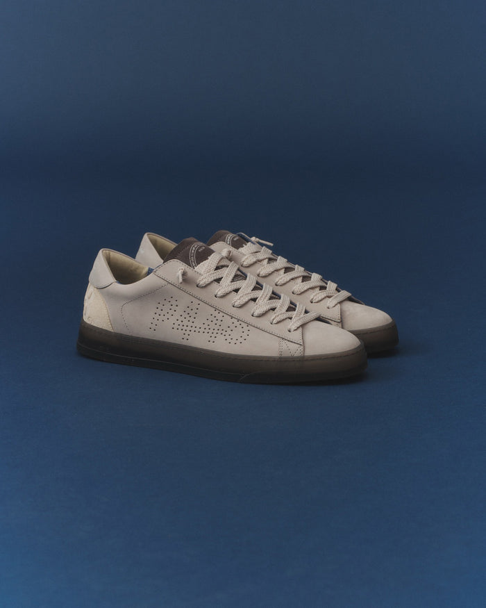 Side angle of grey sneakers