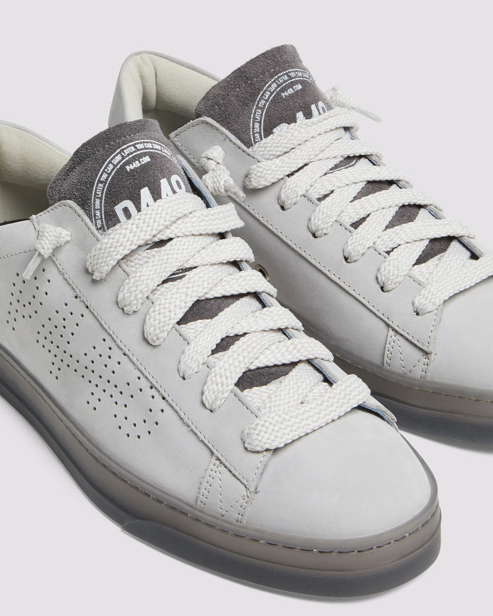 Side angle of grey sneakers