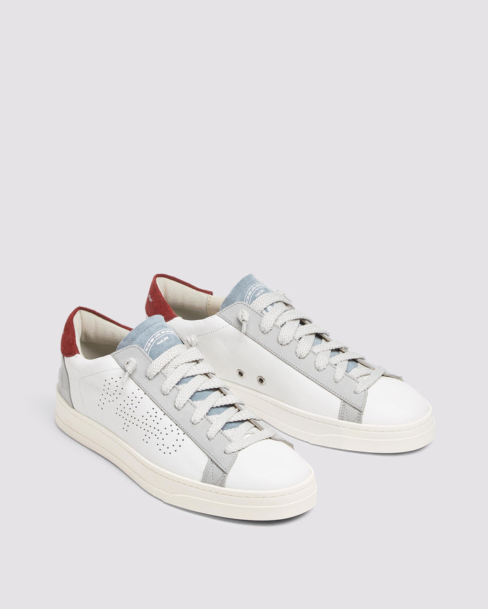 Back angle of white, burgundy and blue sneakers