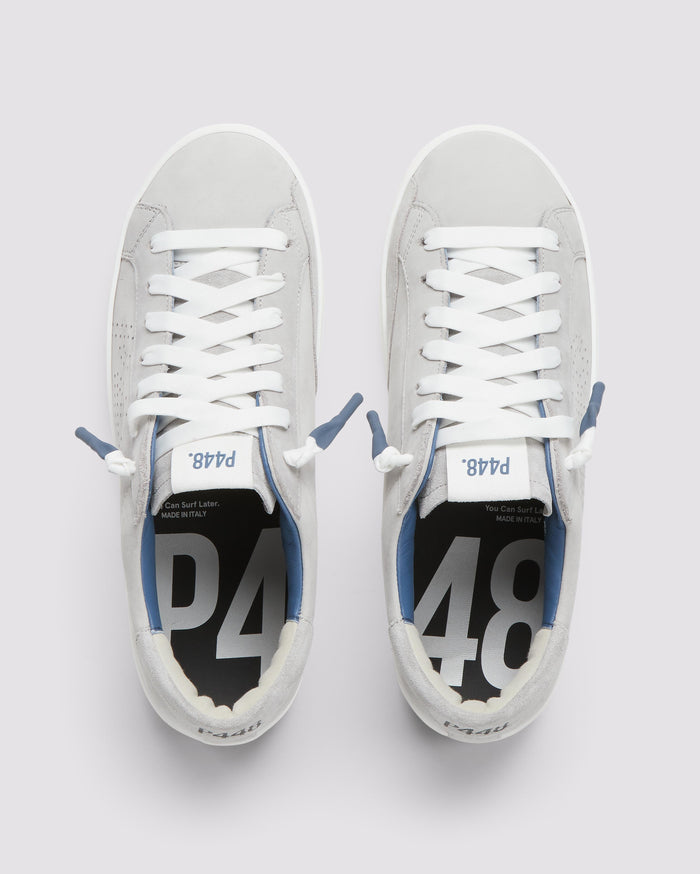 Front angle of gray sneakers