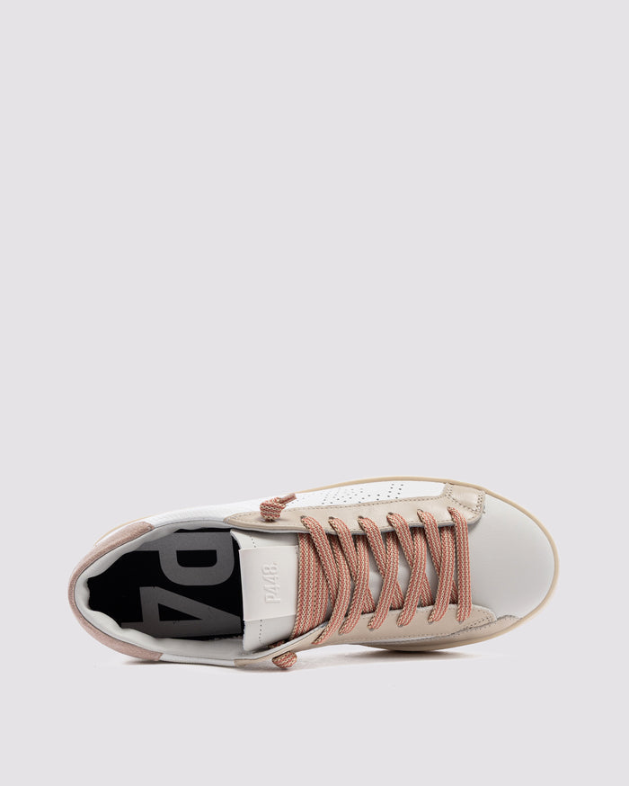 Side angle of beige sneakers