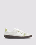 Side angle of green and white sneakers