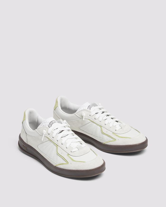 Back angle of green and white sneakers
