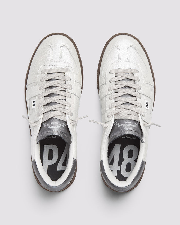 Front angle of white sneakers