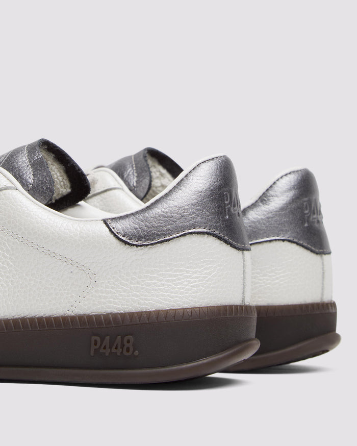 Side angle of white sneakers