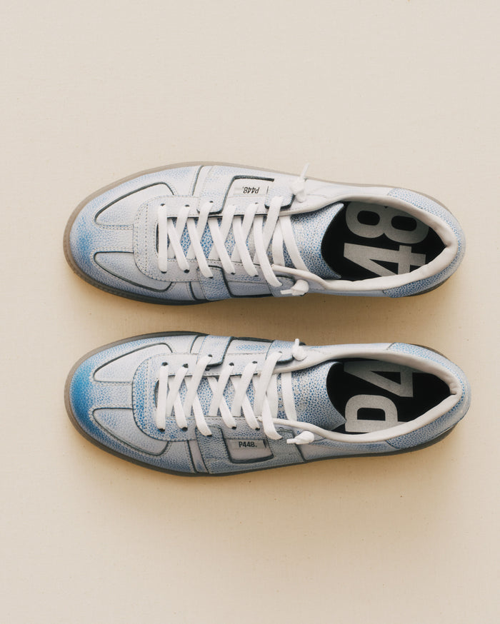 Front angle of blue sneakers