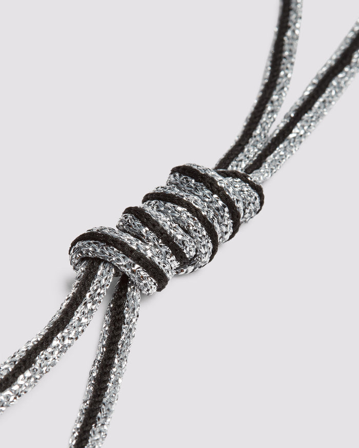 Front angle of black glitter/silver laces