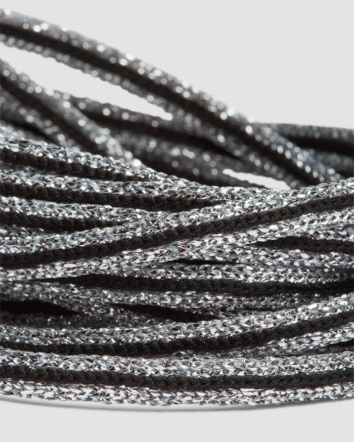 Back angle of black glitter/silver laces