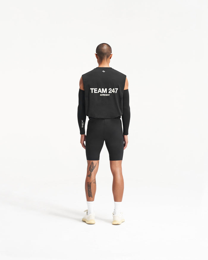 Product image of mens black arm warmers on a plain white background | Team 247 Arm Warmers in Black | Running sleeves with internal logo grips | 247 Accessories | Represent Clo