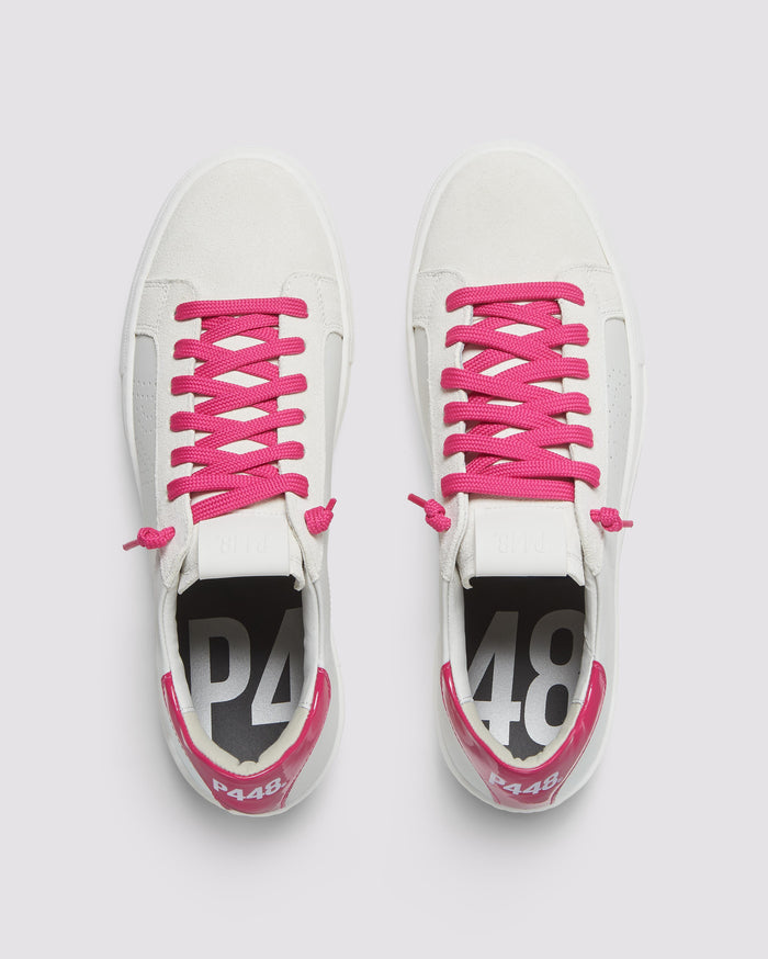 Front angle of white platform sneakers