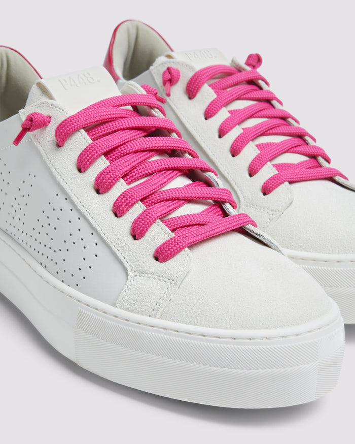 Side angle of white platform sneakers