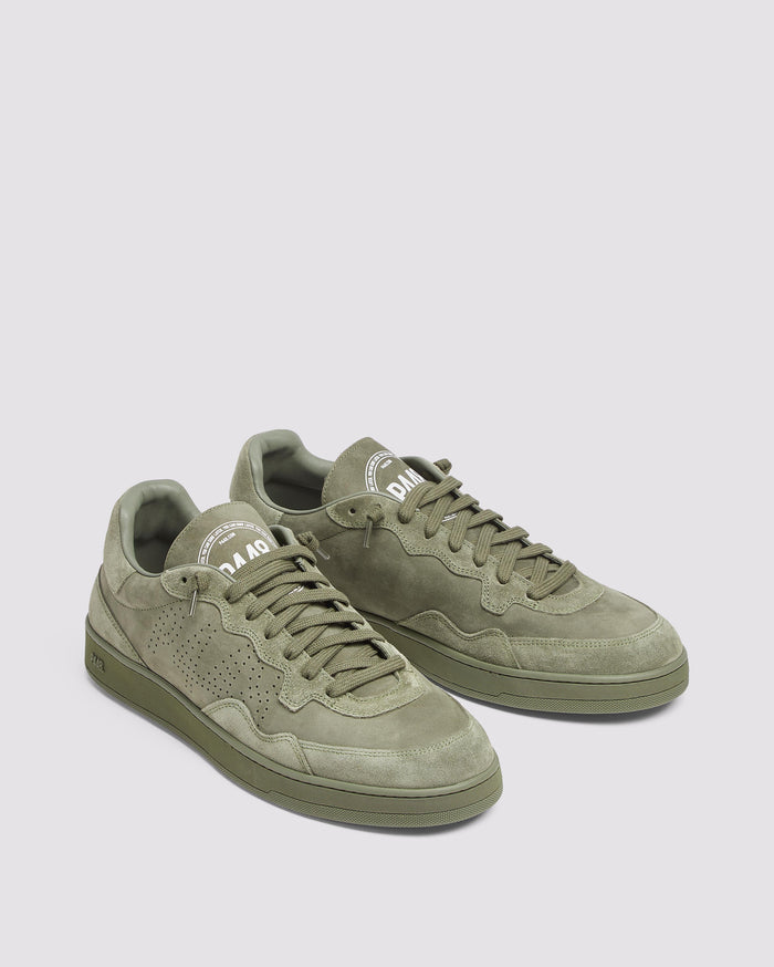 Side angle of green sneakers