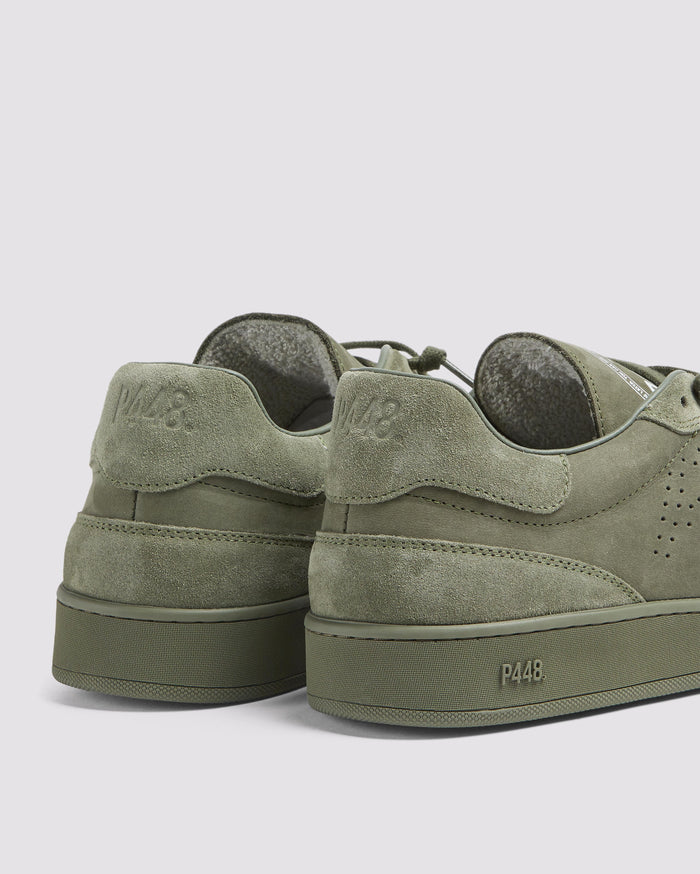 Bottom angle of green sneakers