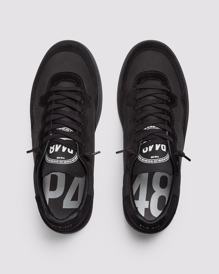Front angle of black sneakers
