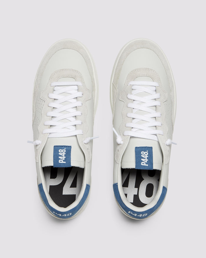 Front angle of white/blue sneakers