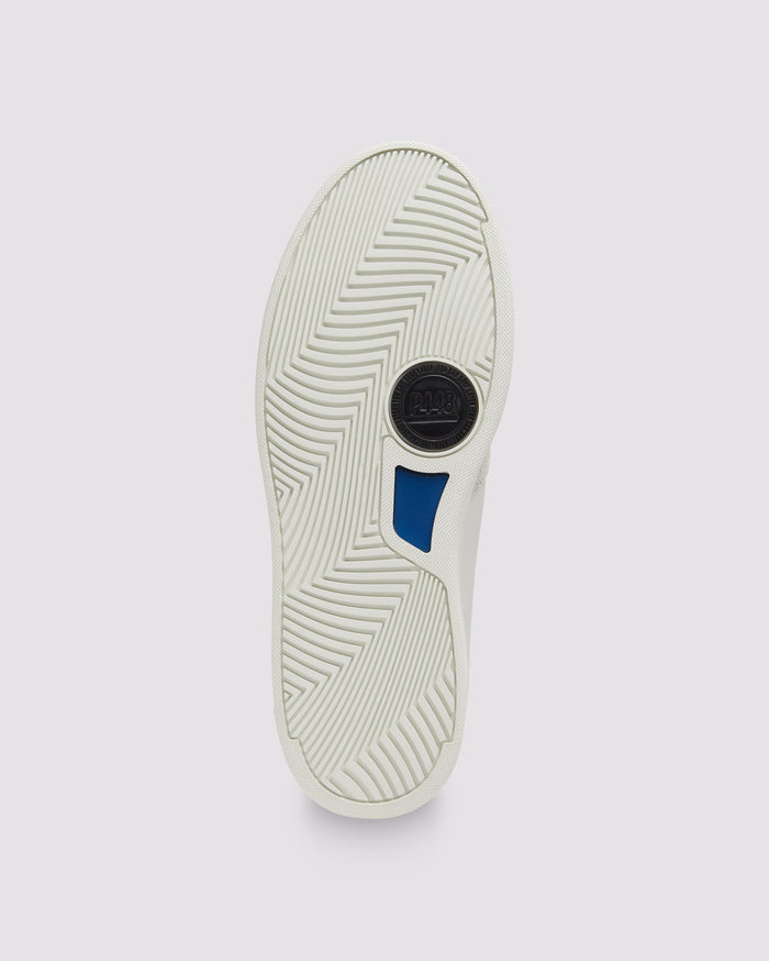 Bottom angle of white/blue sneakers